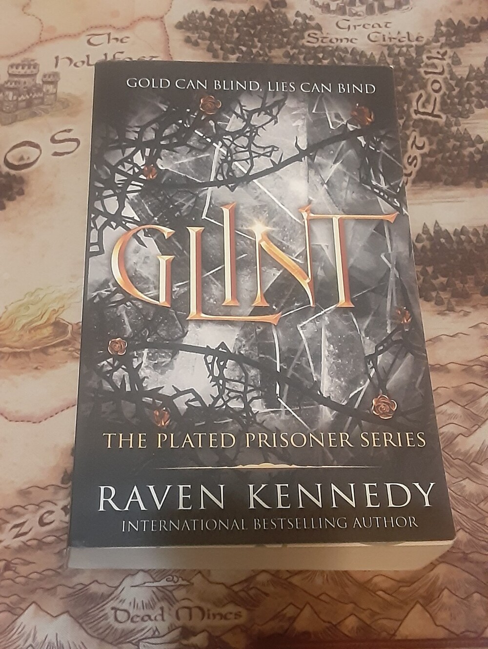 Glint by Raven Kennedy,  The Plated Prisoner series 2024 Bloom trade. Good shape